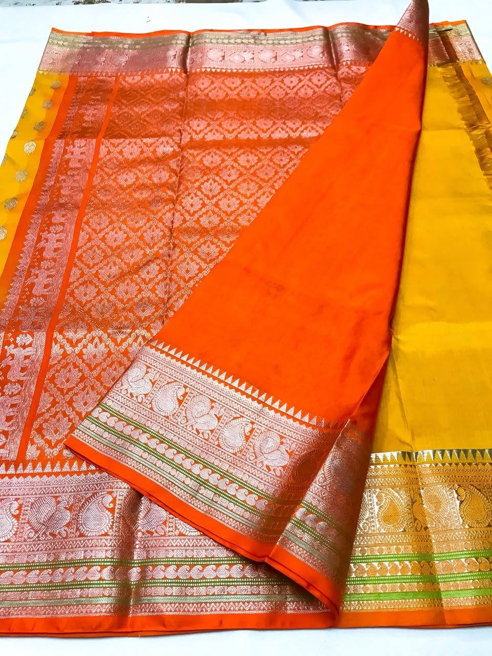 Haldi Yellow Banarasi Katan Silk Saree with Silver Zari & Orange Border - Gold Zari Weave Close-up